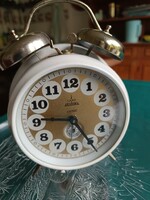 Old mechanical alarm clock in new condition