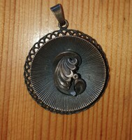 Silver/copper color round necklace, pendant, with a special pattern
