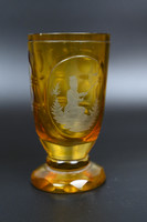 Amber glass cup with polished decoration
