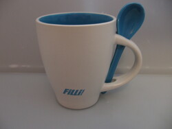 Blue and white ceramic mug with blue porcelain spoon filli stahl