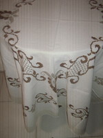 Beautiful hand-embroidered woven tablecloth with a baroque pattern