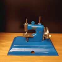 Casige toy sewing machine, German