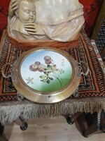 An original Art Nouveau table with an original hand-painted flower-patterned faience bowl. 35.5 cm.