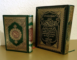 2 Koran Arabic holy book holy book with gold colored decorative cover Islamic religion