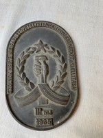 Socialist bronze plaque from 1965.