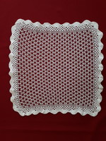 Square crochet tablecloth with a geometric pattern