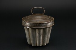 Old, vintage, metal lid confectioner's kuglóf, pudding form.