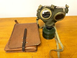 Military leather brown military map bag and old gas mask m67 - retro