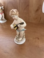 Antique fairy porcelain putto.