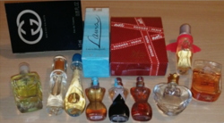 A rare discontinued 10 piece women's vintage mini perfume collection