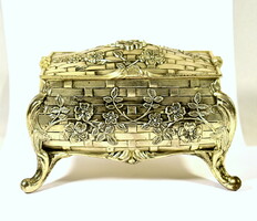 A dreamy larger silver-plated jewelry box with a rich relief pattern