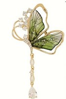 Brooch, brooch bro263 - butterfly with green rhinestones 65x40mm