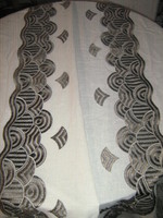 The material is embroidered material for tablecloths, curtains and decoration