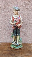 Old German porcelain statue of a boy in a hat with flowers, 29 cm