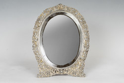 Silver framed table mirror - with a lacy pattern