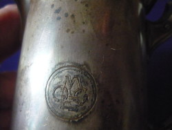 Antique metal spout with monogram