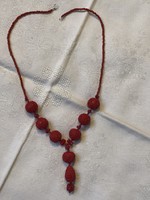 Beautiful genuine cinnabar necklace with coral and silver clasp.