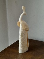 Very nicely carved from ornate peacock bone. Its perfect height is 16 cm.