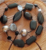 Decorative long onyx necklace with shell, rock crystal and metal sphere decoration