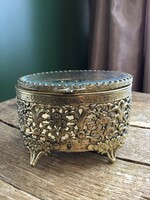 Antique copper jewelry box with a polished glass top