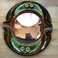 Old industrial art Végvár gyula with a large wall ceramic convex mirror decorated with glass enamel