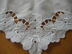 Machine-embroidered tablecloth with a rose pattern