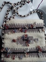 Beautiful hand-made bag made of flower yarn.