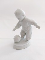 Zsolnay white base glaze little boy playing football (no.: 24/275.)