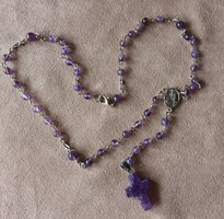 Rosary made of amethyst mineral