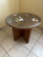 Round coffee table with painted copper sheet decoration