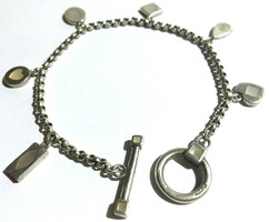 Special silver bracelet inlaid with a silver pendant with charm ornaments, bracelet with t clasp