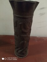 Copper sleeve vase with hammered flower representation