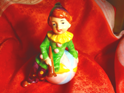 Clown resting on his ball, porcelain nipp