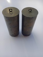 A pair of copper weights for a weighted wall clock, with lead inside.---2---