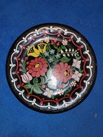 Granite wall plate with folk pattern