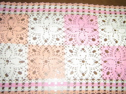 Beautiful hand-crocheted white-pink-orange tablecloth with floral pattern