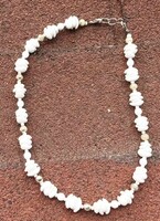 White necklace - perhaps porcelain?