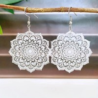 Hoop earrings with a lace effect mandala pattern, very beautiful.