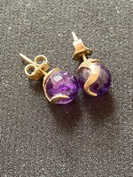 New! Sterling silver plug-in earrings with real polished amethyst, marked 925. The size of the amethyst is 6 mm.