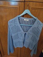 Brand new, light blue, crocheted cardigan.