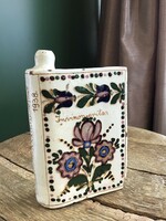 Antique glazed ceramic book bottle from 1938