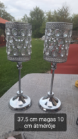 Very nice candle holders. Glass with decoration.