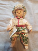 Cute porcelain head doll in perfect condition