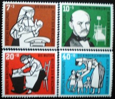 N243-6 / Germany 1956 people's welfare : child care stamp line postal clerk