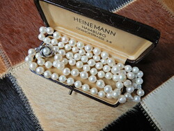 Old long string of Akoya pearls with silver clasp﻿