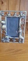 Photo frame, photo holder, photo frame made of metal