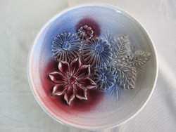 Embossed flower patterned ceramic wall bowl with Csány mark