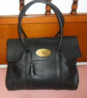Numbered, mulberry leather, women's handbag, black with its own padlock and keys, in excellent condition.