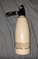 Retro soda bottle with grape pattern.