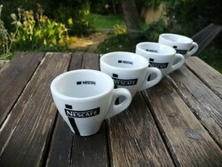 Coffee cup with Nescafé inscription